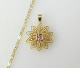 Dainty multicolor star pendant suspended from a 2mm gold plated chain.