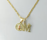 Gold-plated chain necklace with two Virgin Mary pendants and a letter M charm.