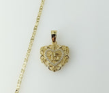 A dainty heart shaped necklace on a gold plated star chain and 2.5mm quince chain.