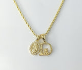 Gold plated Virgin Mary double pendants on 2mm rope braided chain necklace

Gold plated double pendants with Virgin Mary