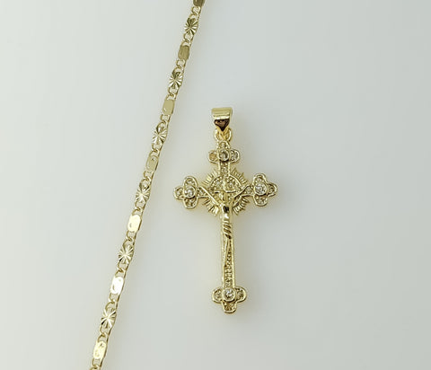 A gold plated solid chain necklace with a small cross pendant.

A delicate gold plated solid chain featuring a small sta