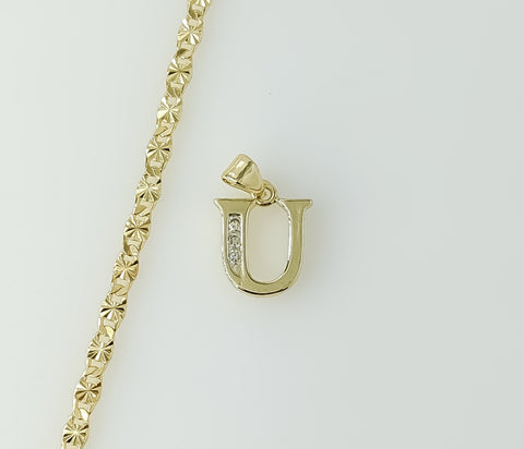 Plated silver dainty star chain necklace featuring a small letter "U" pendant.

Delicate plated silver chain necklace wi