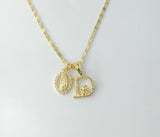 Gold plated double pendants necklace with star chain and letter D charms.

Gold plated letter D charms on a 2mm star cha