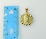 A gold-plated pendant featuring a Virgin Mary silhouette
A gold-plated pendant depicting a Virgin Mary figurine
A gold