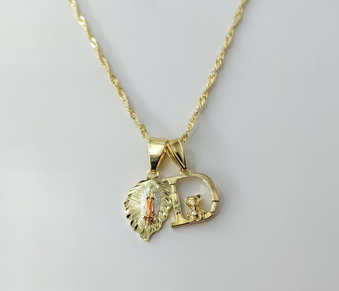 Gold plated 14K twist chain necklace with Virgin Mary pendants and letter D charm.

Gold plated Virgin Mary double penda