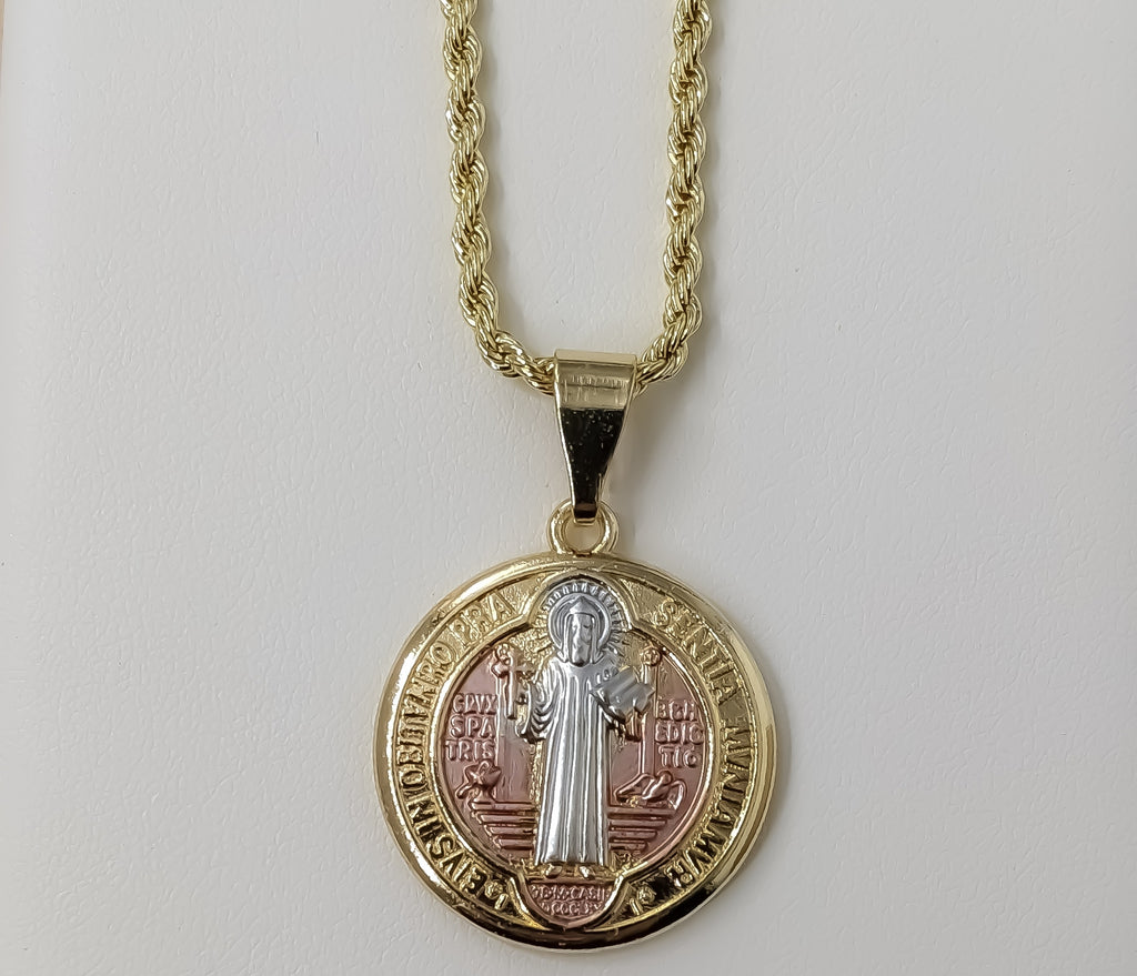 Gold plated Saint Benedict medal pendant on braided chain necklace.
Gold plated Saint Benedict medal pendant on rope cha