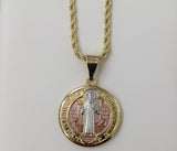 Gold plated Saint Benedict medal pendant on braided chain necklace.
Gold plated Saint Benedict medal pendant on rope cha