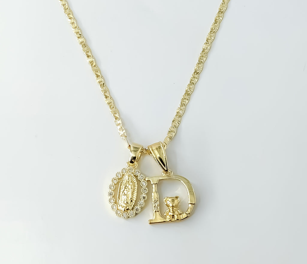 Gold-plated Virgin Mary double pendants on a 2.5mm star chain necklace.

Gold-plated double pendants with Virgin Mary de