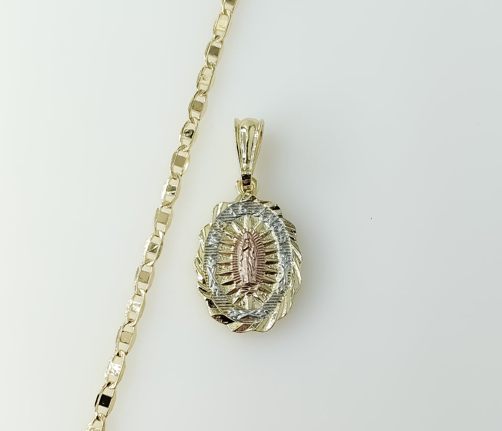 Gold plated anchor chain necklace with Virgin Mary pendant detail.

Gold plated tri-color anchor chain necklace with Vir