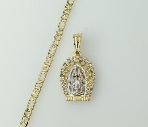 A 14k gold plated diamond cut figaro chain necklace with Virgin Mary charm.