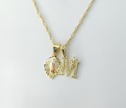 A delicate gold-plated chain necklace featuring double Virgin Mary pendants.

A 14K chain supports two tri-color Virgin