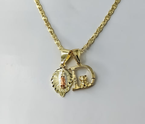 Delicate gold plated tri-color Virgin Mary pendants on a star chain necklace.