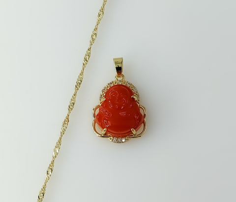 Gold plated Buddha pendant on a 14K twist chain necklace.
Gold plated Buddha pendant suspended from a delicate twist ch