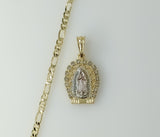 Gold plated Virgin Mary pendant on a 4mm tri-color figaro chain necklace.
Gold plated Virgin Mary pendant set on a tri-c