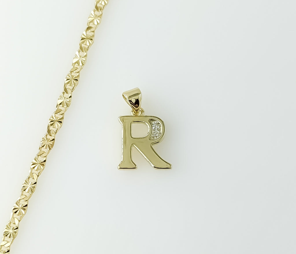 Gold plated dainty star chain necklace with letter "R" pendant charm.

Gold plated dainty star chain necklace featuring
