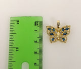 Delicate gold plated butterfly pendant with intricate star details.
Intricate gold plated butterfly design featuring a s