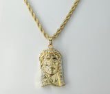 Gold plated braided chain Jesus pendant necklace with rope chain detail.