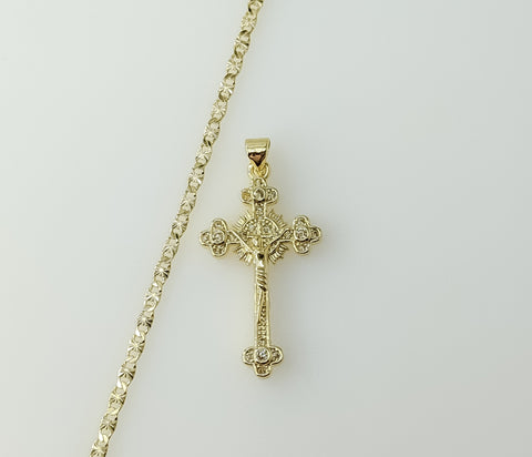 Gold-plated star-shaped cross pendant on a small chain necklace.