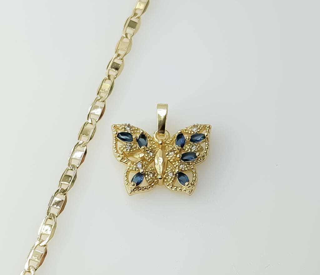 A dainty gold plated flat mariner anchor chain necklace with a butterfly pendant.