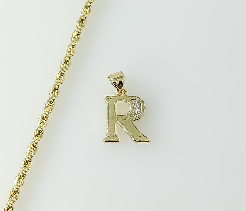 Gold plated rope and braided chain necklace with letter R pendant and delicate chain.

Gold plated rope and braided ch
