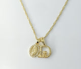 Gold plated double pendants on 14K twist chain necklace with D-shaped Mary pendant.

Gold plated 14K twist chain necklac