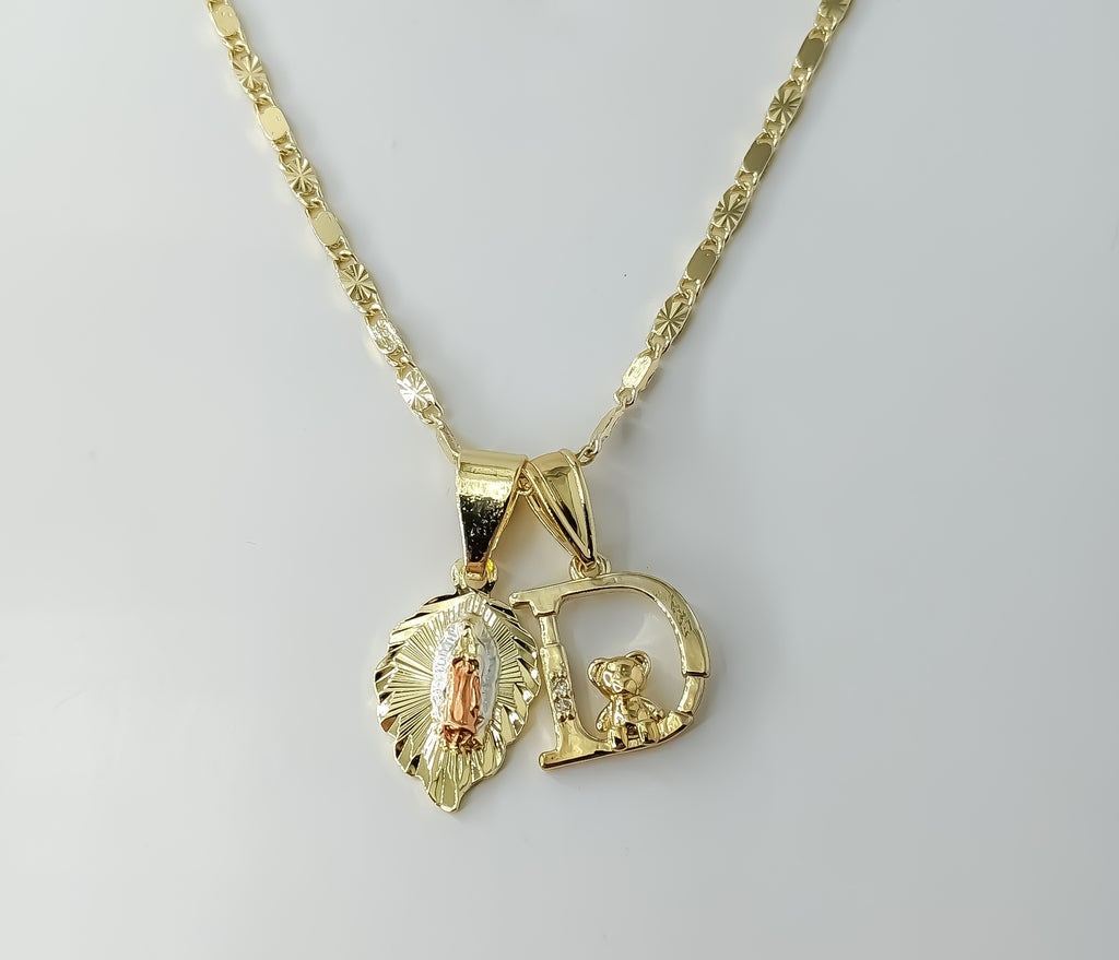 Gold plated tri-color Virgin Mary pendants on a dainty solid chain necklace.

Solid gold plated double pendants with V
