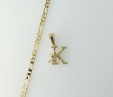 Gold plated figaro chain necklace with dainty letter "K" pendant.
Gold plated dainty letter "K" pendant on figaro chain