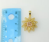 A delicate gold plated pendant featuring a stylized angelic wing.
A small gold plated pendant with a minimalist cross de