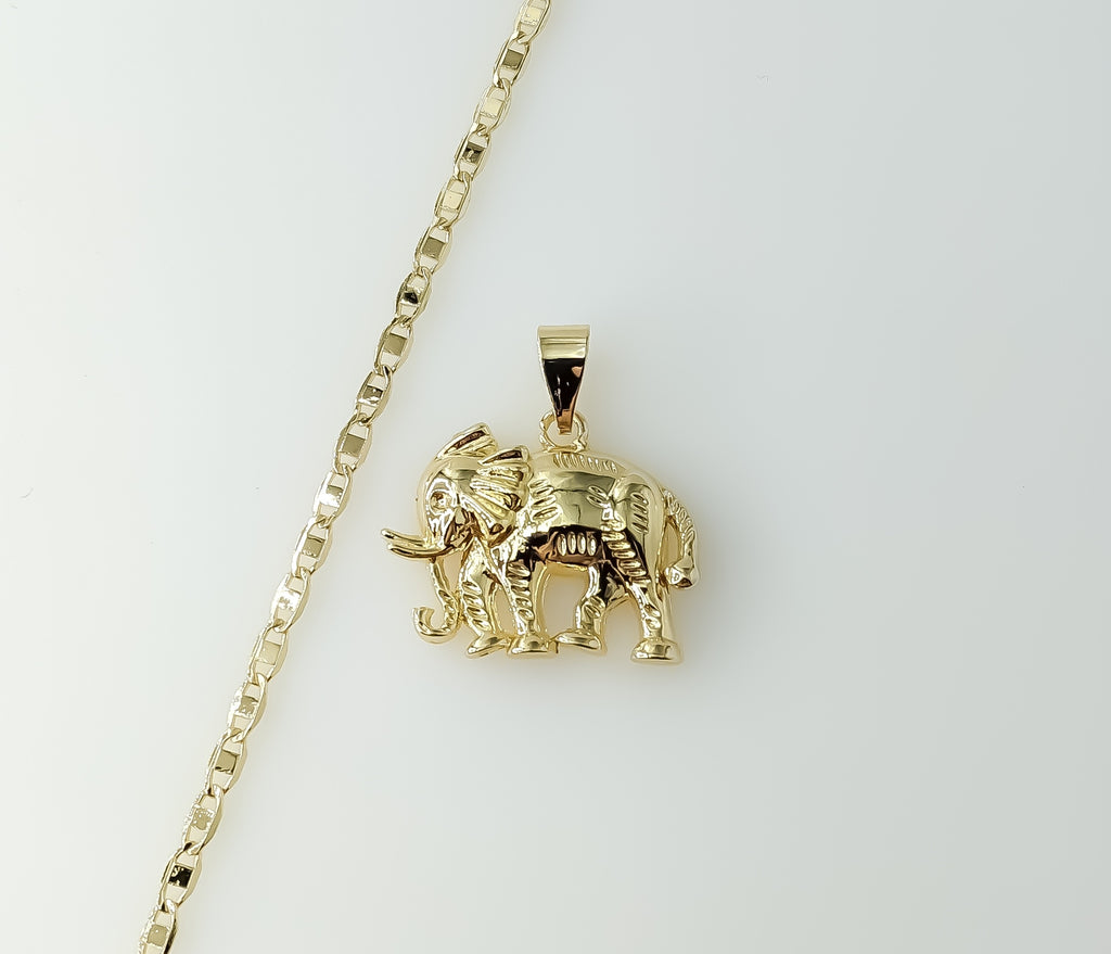 Gold plated Mariner anchor chain necklace with elephant pendant and chain detail.