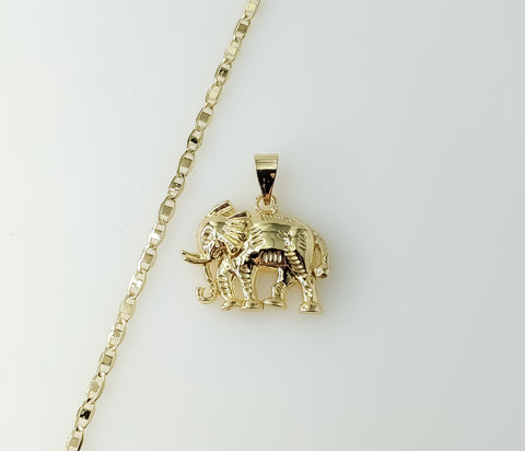 Gold plated Mariner anchor chain necklace with elephant pendant and chain detail.