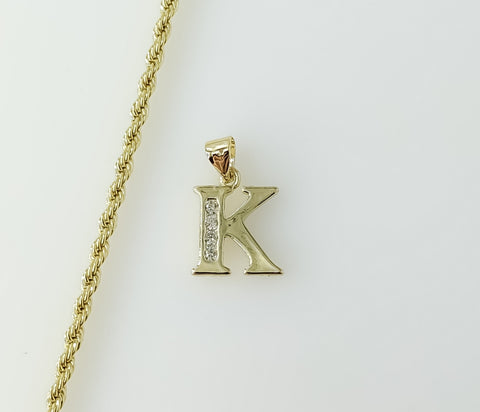 Gold plated rope and braided chain necklace with letter "K" pendant.

Gold plated dainty rope and braided chain necklace