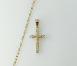A delicate gold plated cross pendant on a small star chain necklace.
