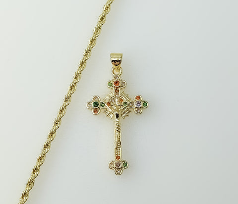 Gold plated small cross Jesus crucifix pendant on a braided chain necklace.
A small gold plated cross Jesus crucifix pen