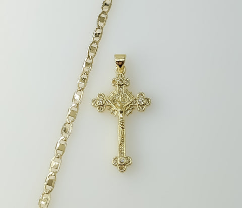 A gold plated mariner anchor chain necklace with a small cross pendant.

A gold plated chain necklace with a small cross
