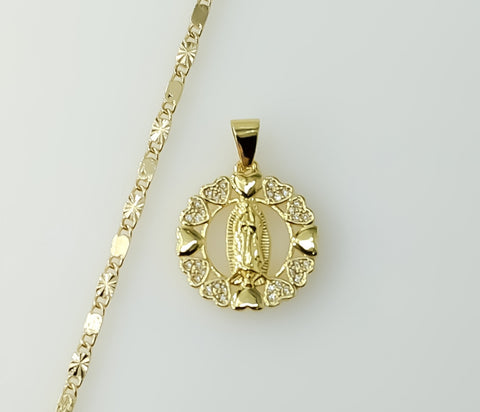 Gold plated Virgin Mary charm on a small solid 2mm star chain necklace.
Gold plated Virgin Mary pendant on a delicate 2m