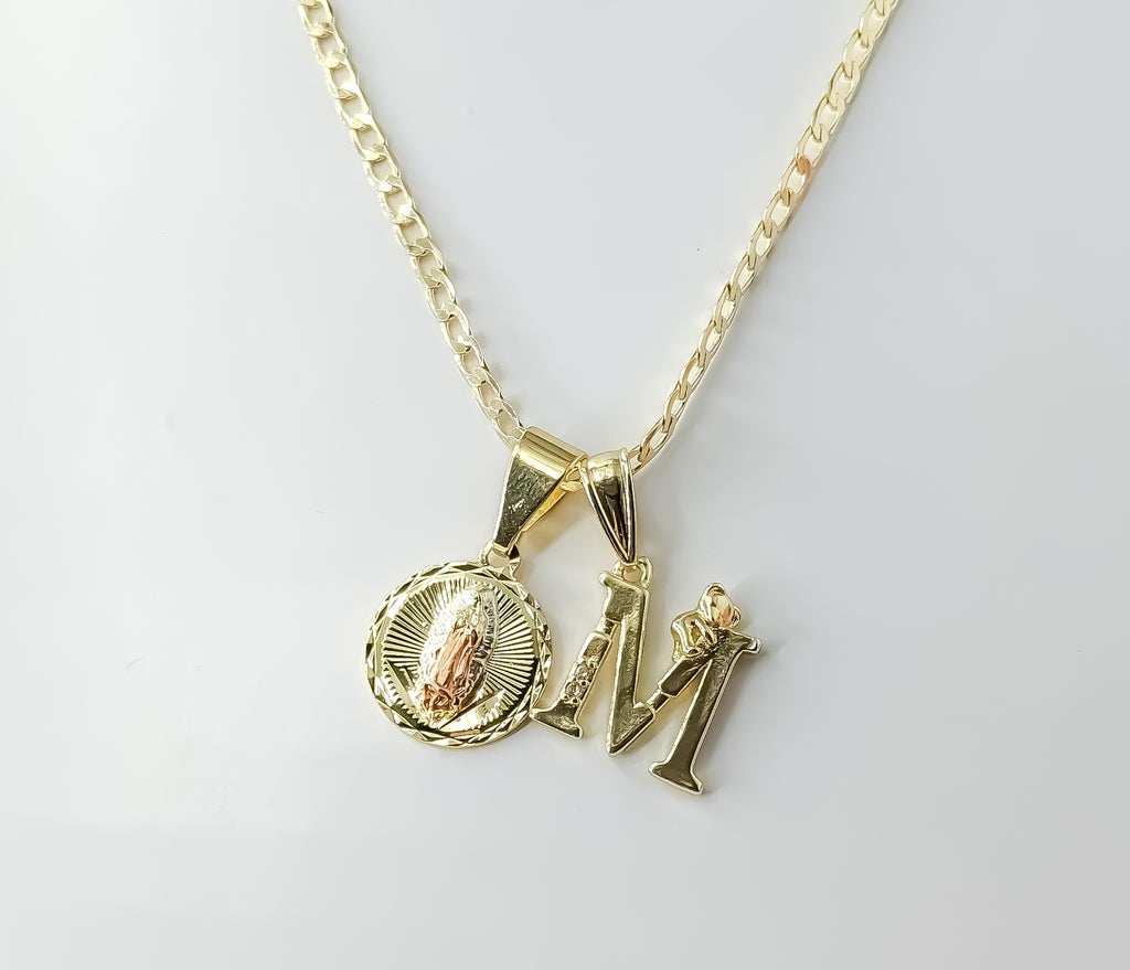 Gold plated Virgin Mary double pendants on a tri-color Cuban chain necklace.