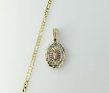 Gold plated 3mm figaro chain necklace with Virgin Mary pendant details
Virgin Mary figurine pendant on a gold plated tr