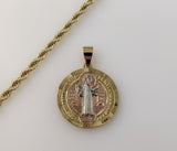Gold plated Saint Benedict medal pendant on a braided chain necklace.
Gold plated Saint Benedict medal pendant on a rope