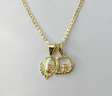 Gold plated Virgin Mary double pendants on a 14K tri-colored chain necklace.
Gold plated Virgin Mary double pendants wit