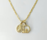 Gold plated double pendants necklace with delicate chain and Virgin Mary charm.

Gold plated dainty Virgin Mary double p