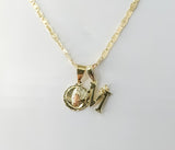 Gold plated Virgin Mary double pendants on 3mm mariner chain necklace.
Tri-color letter M and flat anchor pendant on del