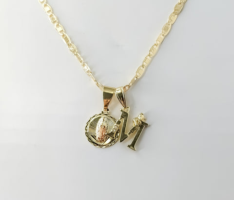 Gold plated Virgin Mary double pendants on 3mm mariner chain necklace.
Tri-color letter M and flat anchor pendant on del