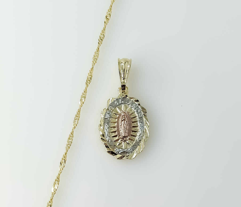 Gold plated 14K twist chain necklace with Virgin Mary charm in intricate design style.