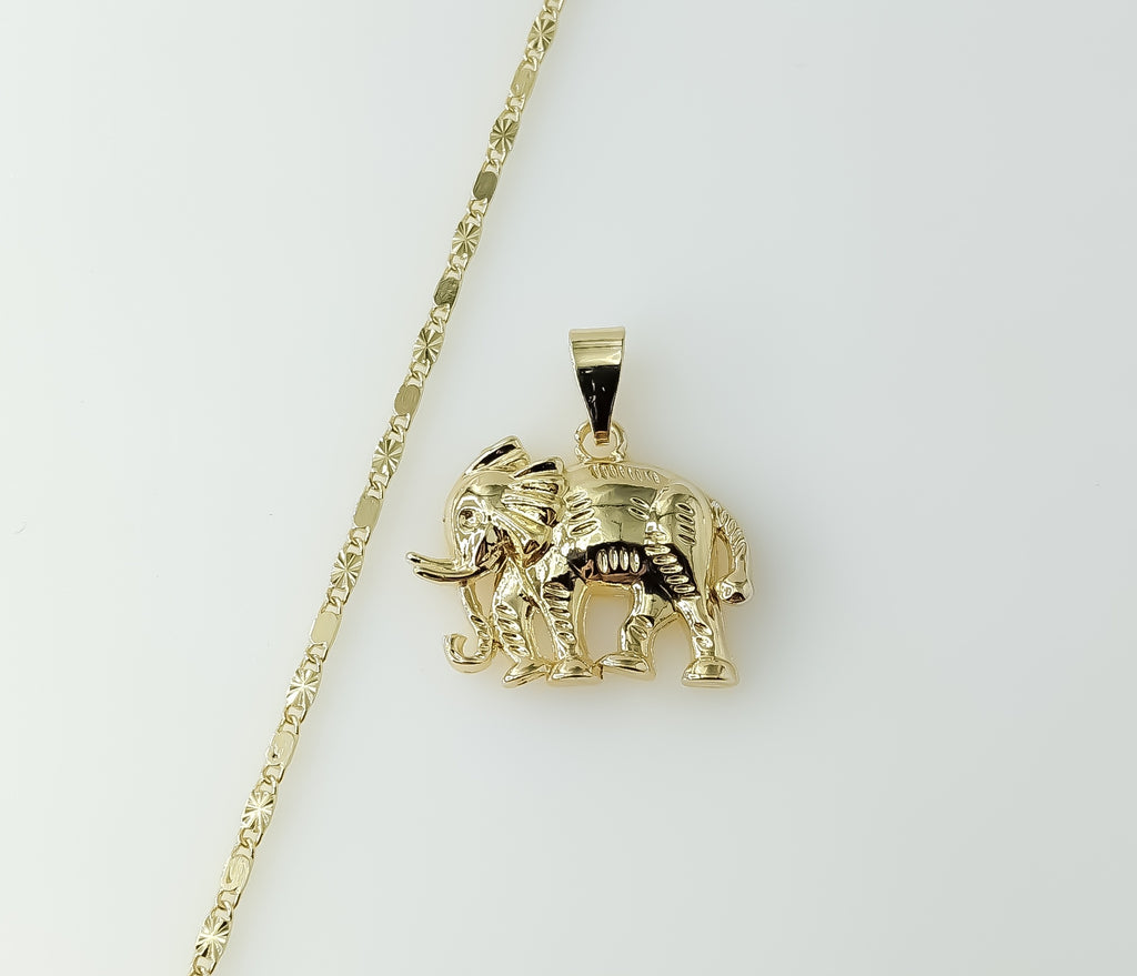 Gold plated chain necklace featuring a solid elephant pendant and star design.

Gold plated chain necklace with a detail