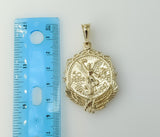 Double-sided star pendant with intricate geometric carvings.
Geometric star-shaped pendant with ornate etched details.
E