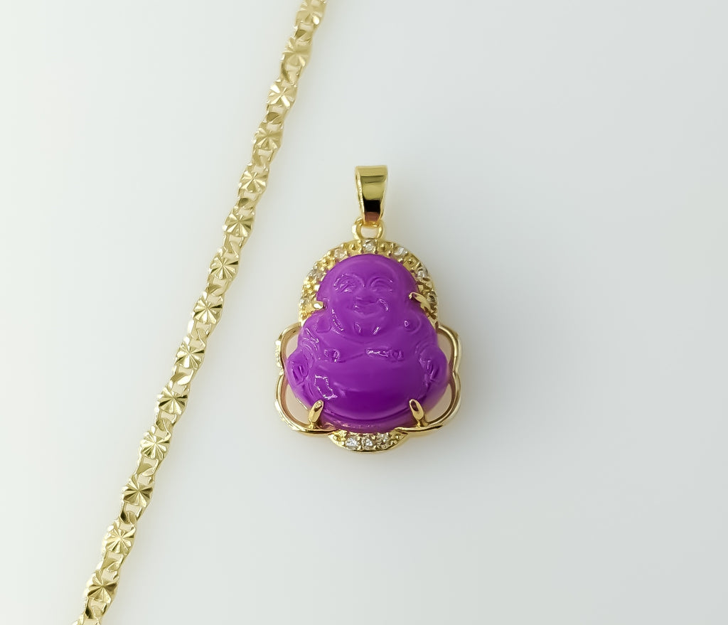 Gold plated chain necklace featuring a dainty Buddha pendant and star design.
Gold plated Buddha pendant suspended from