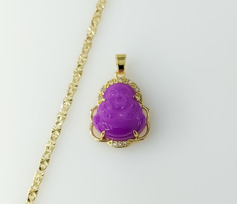Gold plated chain necklace featuring a dainty Buddha pendant and star design.
Gold plated Buddha pendant suspended from