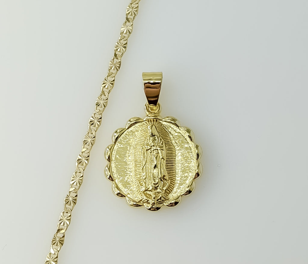 Gold plated Virgin Mary pendant on a 3mm star chain necklace.

Gold plated Virgin Mary charm on a delicate 3mm star chai