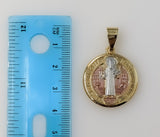 Golden Saint Benedict medal pendant with a rounded edge shape.
Rounded golden pendant featuring a Saint Benedict medal s