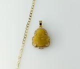 Gold plated 14K Buddha pendant on a 3mm Cuban chain necklace.

Gold plated Buddha pendant and chain Cuban link necklace.